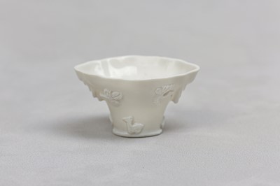 Lot 33 - A CHINESE BLANC-DE-CHINE LIBATION CUP.