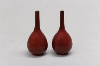 Lot 82 - A PAIR OF CHINESE COPPER RED-GLAZED VASES.