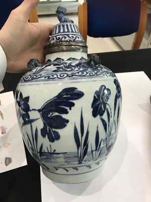 Lot 232 - A CHINESE BLUE AND WHITE ‘LOTUS POND’ JAR AND COVER.