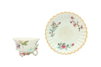 Lot 679 - A CHINESE FAMILLE ROSE EXPORT TEA BOWL AND SAUCER.