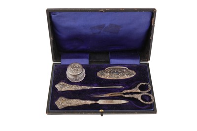 Lot 15 - A CASED STERLING SILVER MANICURE SET WITH SIX FURTHER STERLING SILVER DRESSING TABLE ITEMS