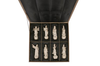 Lot 419 - A SET OF EIGHT CHINESE POTTERY FIGURES OF IMMORTALS, LATER BOXED