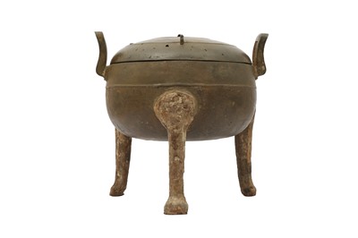 Lot 307 - A CHINESE BRONZE DING WITH IRON LEGS AND A COVER.