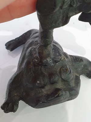Lot 666 - A CHINESE BRONZE 'LIU HAI' CANDLE STICK AND A SMALL VASE.