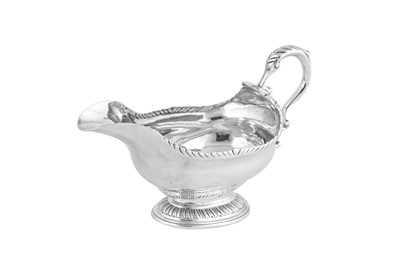 Lot 559 - A George III Scottish sterling silver sauce boat, Edinburgh 1762 by Lothian and Robertson