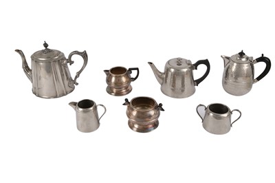 Lot 341 - A PLANISHED PEWTER THREE PIECE TEASET, 20TH CENTURY