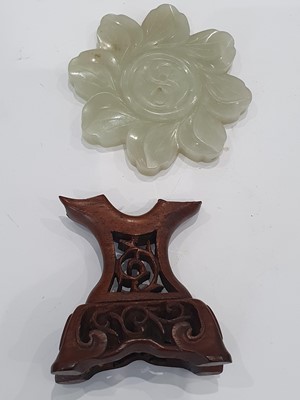 Lot 44 - A CHINESE CARVED JADE 'FLOWER' PLAQUE.