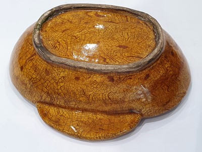 Lot 51 - A CHINESE MARBLE-GLAZED EAR CUP.