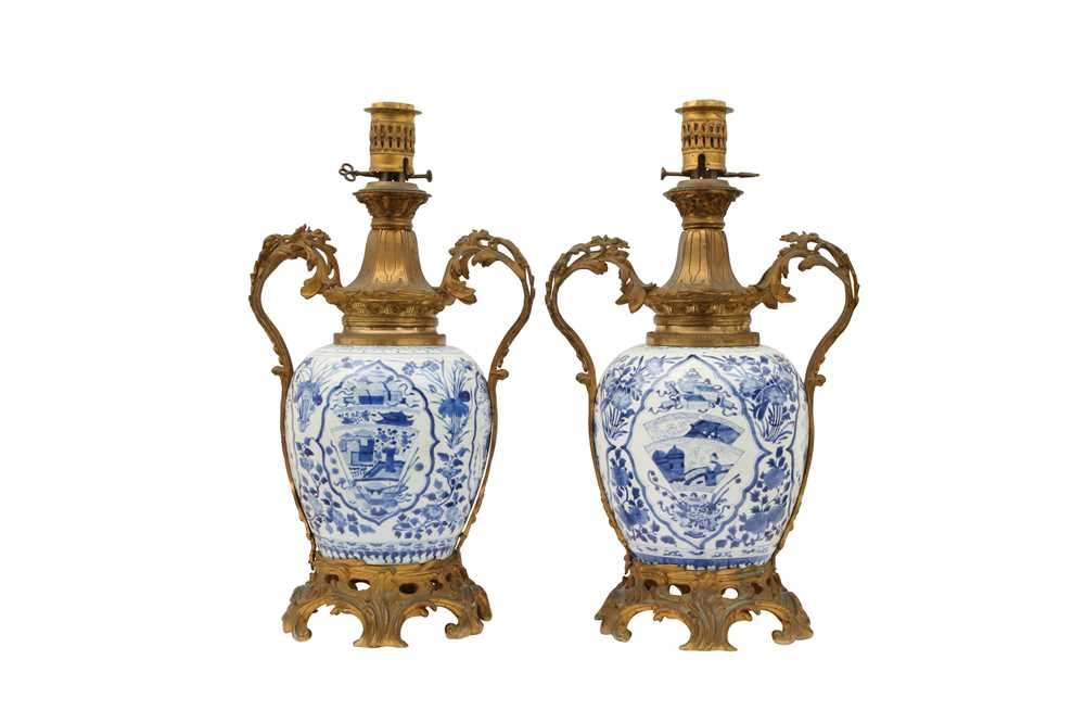 Lot 233 - A PAIR OF CHINESE ORMOLU-MOUNTED BLUE AND WHITE JARS.