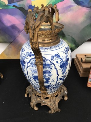 Lot 233 - A PAIR OF CHINESE ORMOLU-MOUNTED BLUE AND WHITE JARS.