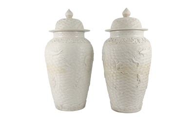 Lot 406 - A PAIR OF LARGE CONTEMPORARY CHINESE BLANC DE CHINE BALUSTER VASES AND COVERS