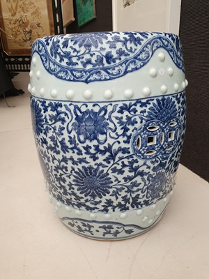 Lot 311 - A PAIR OF CHINESE BLUE AND WHITE BARREL STOOLS.