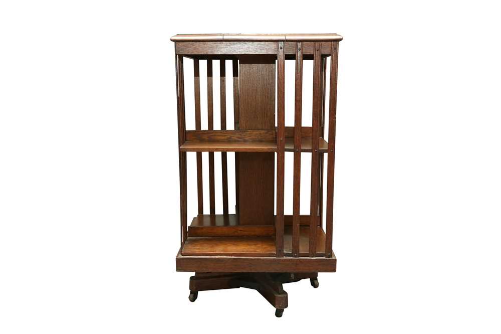 Lot 206 - AN OAK REVOLVING BOOKCASE, EARLY 20TH CENTURY