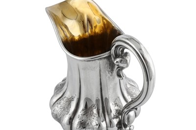 Lot 504 - A large early Victorian sterling silver milk jug, Birmingham 1839 by William Ryland (reg. Jan 1838)
