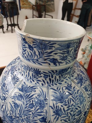 Lot 234 - A PAIR OF LARGE CHINESE BLUE AND WHITE VASES AND COVERS.