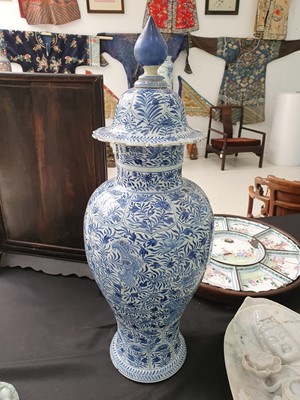 Lot 123 - A PAIR OF LARGE CHINESE BLUE AND WHITE VASES AND COVERS.