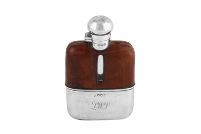 Lot 46 - A George V sterling silver spirit hip flask, Sheffield 1933 by G & J W Hawksley