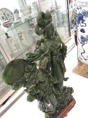 Lot 583 - A LARGE CHINESE SPINACH JADE CARVING OF TWO CELESTIAL LADIES.
