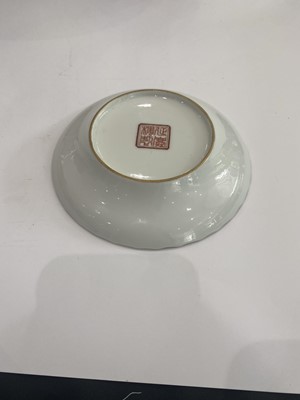 Lot 103 - A SET OF THREE CHINESE PINK-ENAMELLED FOLIATE DISHES.