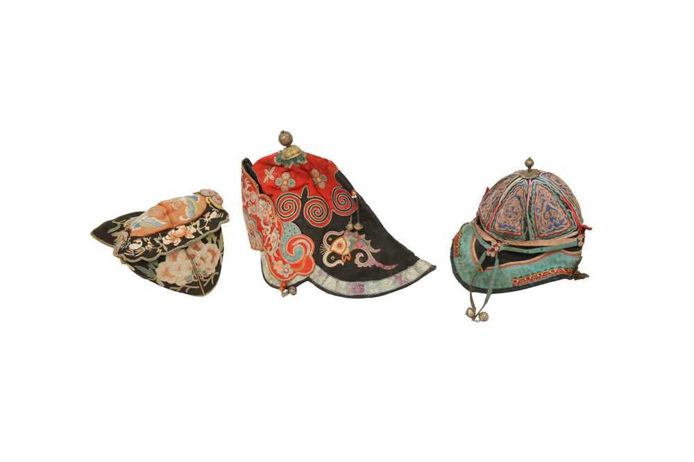 Lot 601 - THREE CHINESE EMBROIDERED HATS.