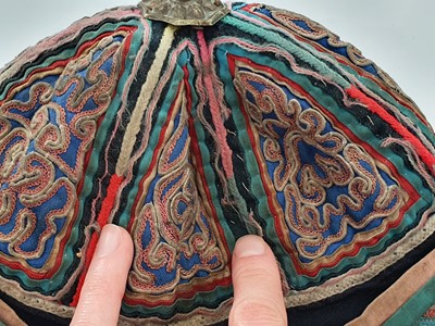 Lot 601 - THREE CHINESE EMBROIDERED HATS.