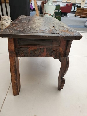 Lot 823 - A TIBETAN LOW POLYCHROMED WOOD OFFERING TABLE.