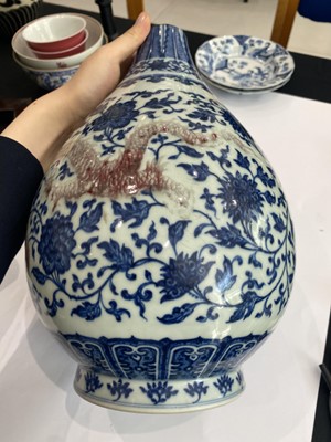 Lot 761 - A CHINESE BLUE AND WHITE AND UNDERGLAZE RED 'DRAGON' VASE.