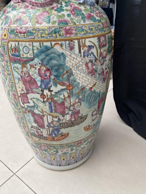 Lot 550 - A PAIR OF LARGE CHINESE CANTON FAMILLE ROSE VASES.
