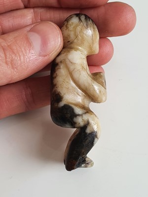 Lot 188 - A CHINESE BLACK JADE CARVING OF A FIGURE.