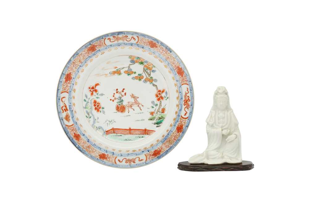 Lot 542 - A CHINESE BLANC-DE-CHINE FIGURE OF GUANYIN AND A 'DEER' DISH.