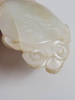 Lot 189 - A CHINESE CARVED JADE ‘CHANG’E AND RABBITS’ GROUP.