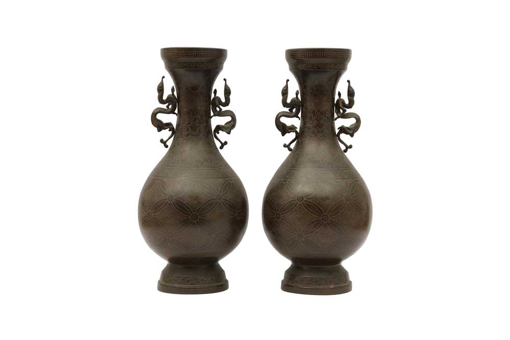 Lot 788 - A PAIR OF VIETNAMESE SILVER-INLAID VASES.