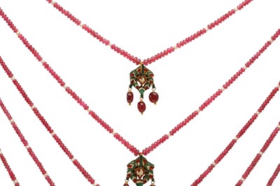 Lot 232 - A MULTI-STRANDED PEARL AND SPINEL BEADS NECKLACE WITH DIAMOND-SET FLORAL PENDANTS