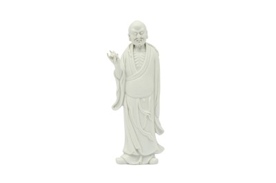 Lot 703 - A CHINESE BLANC-DE-CHINE FIGURE OF A LUOHAN.
