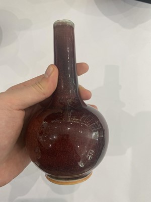 Lot 94 - A CHINESE COPPER-RED BOTTLE VASE.