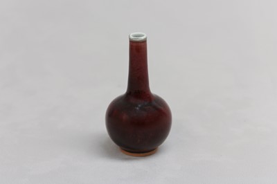 Lot 94 - A CHINESE COPPER-RED BOTTLE VASE.