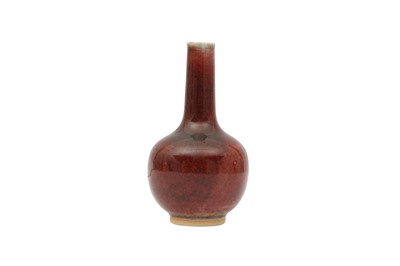 Lot 95 - A CHINESE COPPER-RED VASE.