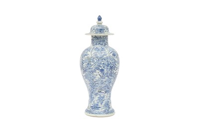 Lot 499 - A CHINESE BLUE AND WHITE BALUSTER 'BLOSSOMS' VASE AND COVER.