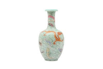 Lot 325 - A CHINESE FAMILLE ROSE DRAGON VASE.