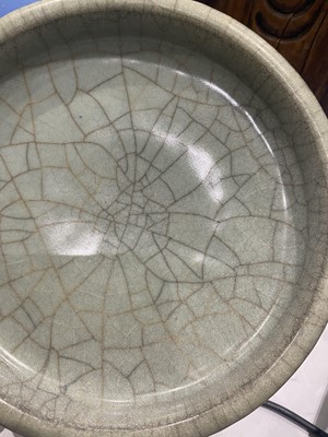 Lot 563 - A CHINESE CRACKLE GLAZED DISH.