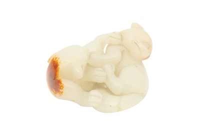 Lot 337 - A CHINESE WHITE JADE 'DOUBLE BADGER' GROUP.