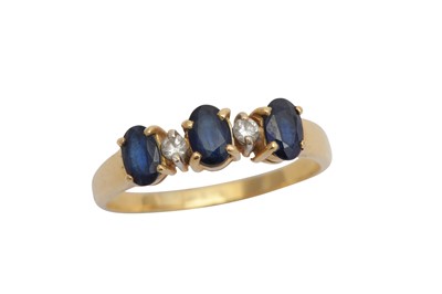Lot 9 - A FIVE-STONE SAPPHIRE AND DIAMOND RING