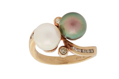 Lot 167 - A pearl and diamond toi & moi ring