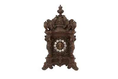Lot 305 - AN ORNATE FRENCH BRONZE TABLE CLOCK