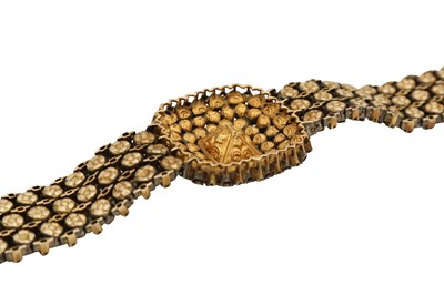 Lot 378 - A MUGHAL-REVIVAL DIAMOND AND EMERALD BRACELET