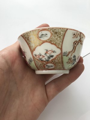 Lot 681 - A PAIR OF CHINESE FAMILLE ROSE CUPS AND SAUCERS.