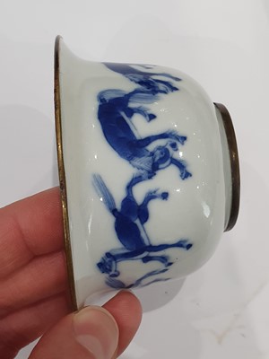 Lot 363 - A VIETNAMESE BLUE AND WHITE 'HORSES' CUP.