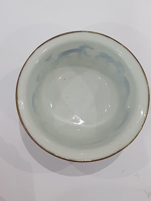 Lot 363 - A VIETNAMESE BLUE AND WHITE 'HORSES' CUP.