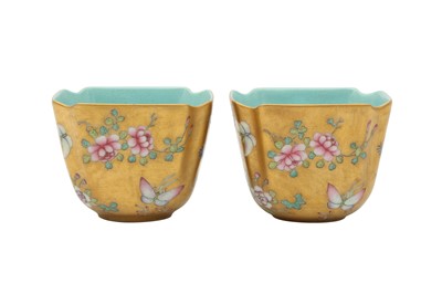 Lot 200 - A PAIR OF CHINESE FAMILLE ROSE GILT-GROUND CUPS.