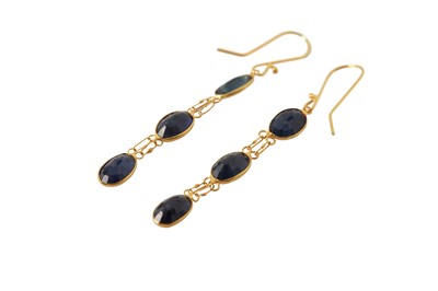 Lot 180 - A pair of sapphire pendent earrings